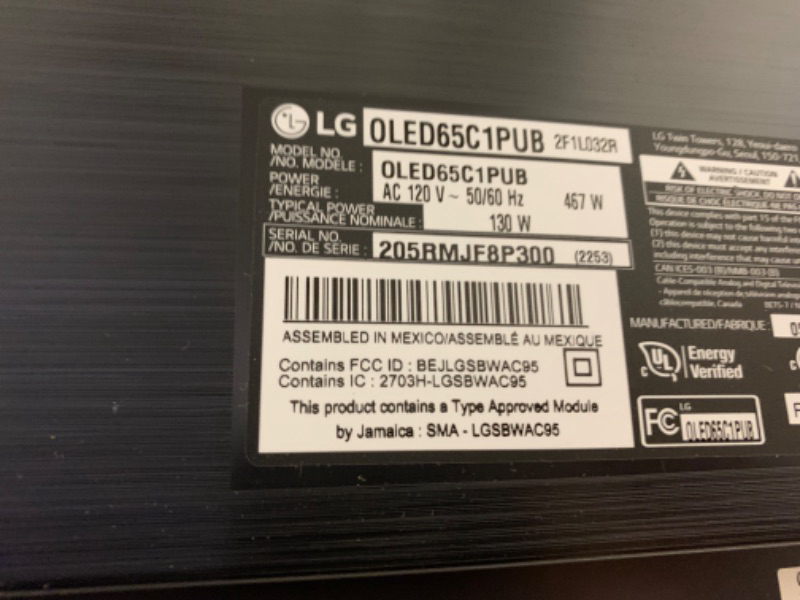 Photo 4 of LG C1 Series 65-Inch Class OLED Smart TV OLED65C1PUB, 2021 - 4K TV, Alexa Built-in, Box Packaging Damaged, Minor Use, Missing Stand, Item Turns on.
