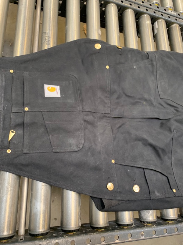 Photo 6 of Black CArhartt Relaxed Fit Overalls, 34x30, No Box Packaging. Moderate Use, Slightly Dirty From Previous Use, Minor Tears in Fabric