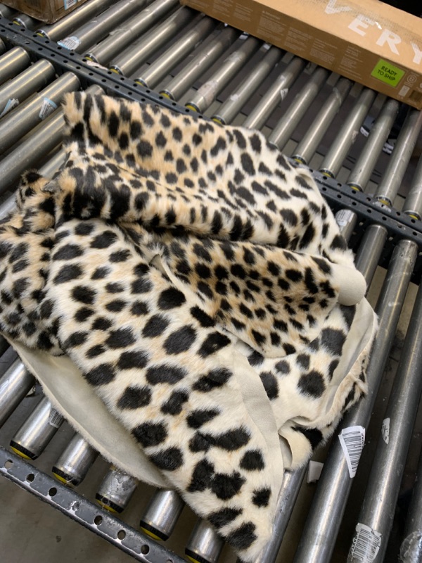 Photo 4 of 5'3"X7'10" Cheetah Loomed Novelty Area Rug - Erin Gates By Momeni, No Box Packaging, Minor Use, Minor Fraying on Edges, Creases and Wrinkles in Rug, Dirty From Shipping and Handling, Tape on Rug
