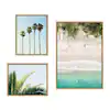 Photo 1 of 33 in. x 23 in. Sylvie Tropical Beach Framed Canvas Set Framed Canvas Wall Art (Set of 3)
