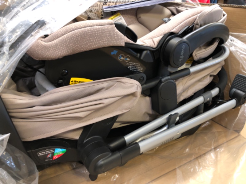 Photo 3 of Evenflo Pivot Modular Travel System with SafeMax Infant Car Seat - Sandstone