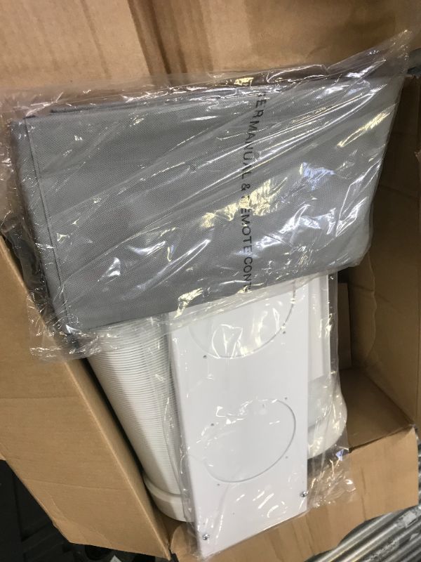 Photo 1 of 14,000 BTU Portable Air Conditioner with Dehumidifier and Remote