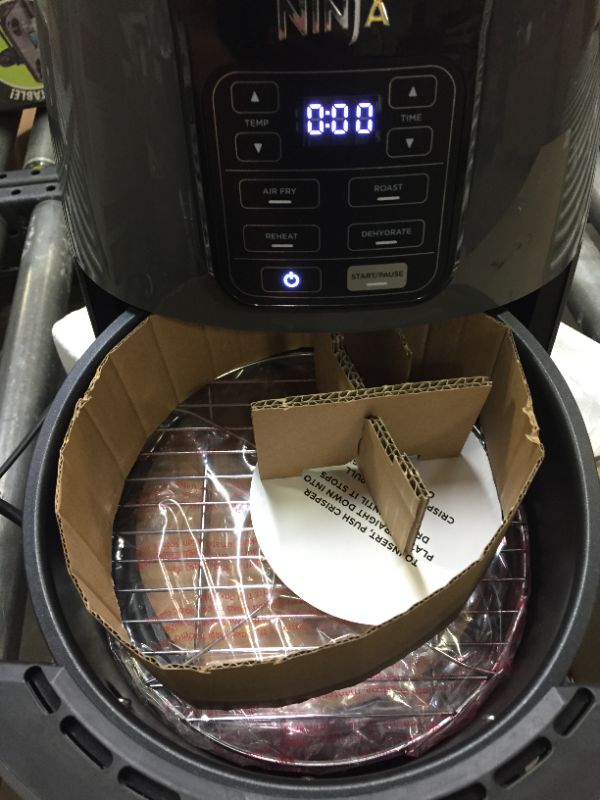Photo 2 of 4 Qt. Electric Black Air Fryer with Recipe Book (AF101) MINOR CUT ON TOP OF AIR FRYER, INTERIOR NEVER USED. 