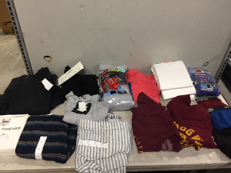 Photo 1 of BAG LOT OF 13 MEN CLOTHING ITEMS - DIFFERENT STYLES AND SIZES- SOME ARE NEW AND SOME ARE USED- --SOLD AS IS --