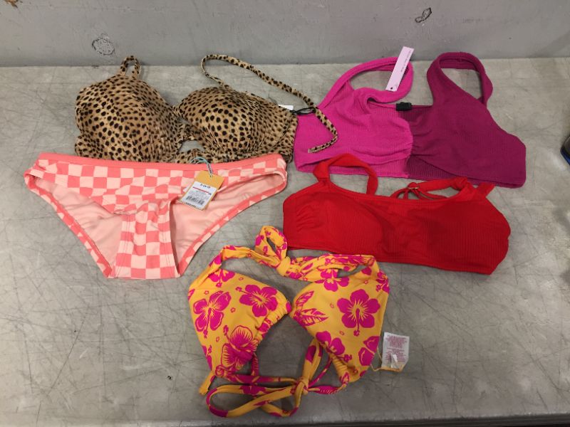 Photo 1 of BAG LOT OF WOMEN'S BIKINIS -BOTTOMS AND TOPS - DIFFERENT STYLES AND SIZES ---SOLD AS IS --