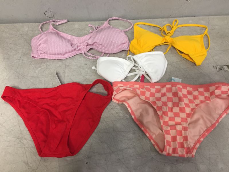 Photo 1 of BAG LOT OF WOMEN'S BIKINIS -BOTTOMS AND TOPS - DIFFERENT STYLES AND SIZES ---SOLD AS IS --