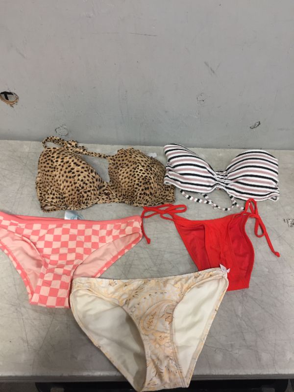 Photo 1 of BAG LOT OF WOMEN'S BIKINIS -BOTTOMS AND TOPS - DIFFERENT STYLES AND SIZES ---SOLD AS IS --