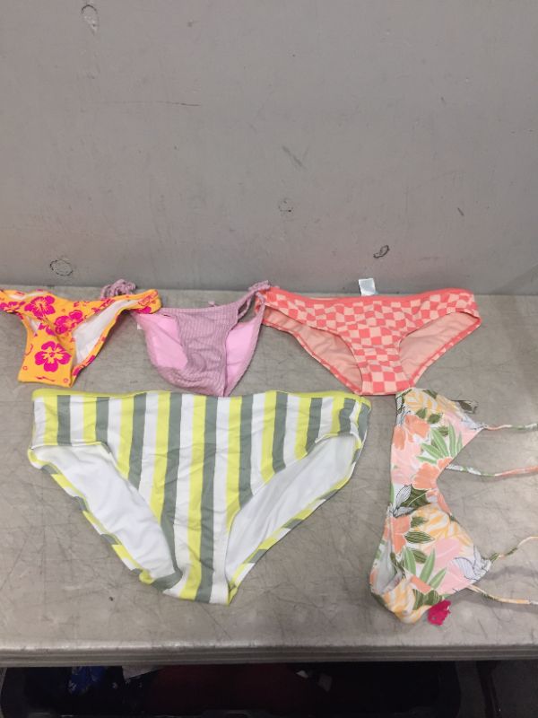 Photo 1 of BAG LOT OF WOMEN'S BIKINIS -BOTTOMS AND TOPS - DIFFERENT STYLES AND SIZES ---SOLD AS IS --