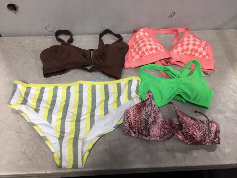 Photo 1 of BAG LOT OF WOMEN'S BIKINIS -BOTTOMS AND TOPS - DIFFERENT STYLES AND SIZES ---SOLD AS IS --