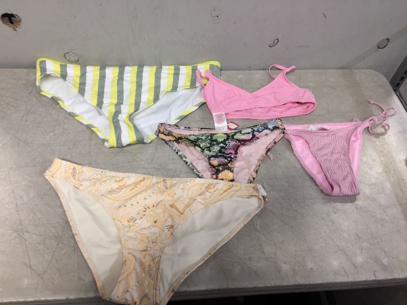 Photo 1 of BAG LOT OF WOMEN'S BIKINIS -BOTTOMS AND TOPS - DIFFERENT STYLES AND SIZES ---SOLD AS IS --