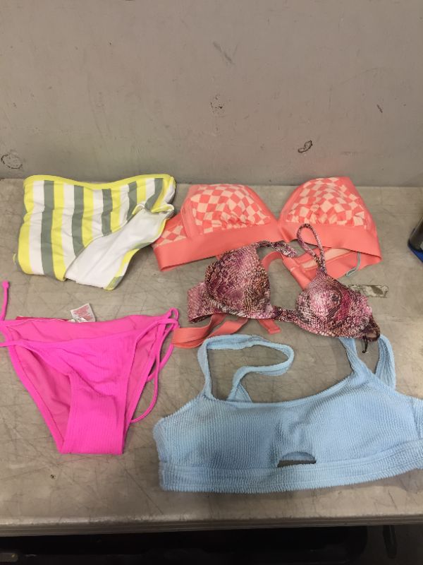 Photo 1 of BAG LOT OF WOMEN'S BIKINIS -BOTTOMS AND TOPS - DIFFERENT STYLES AND SIZES ---SOLD AS IS --