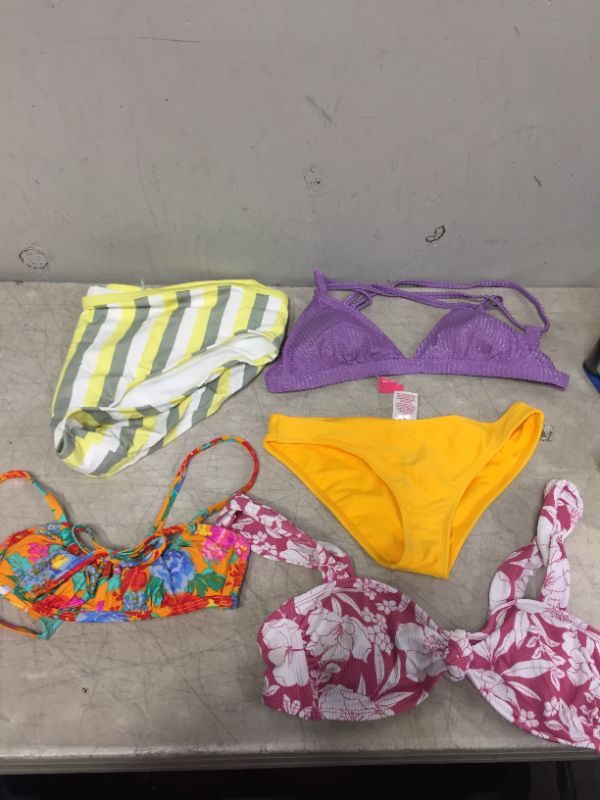 Photo 1 of BAG LOT OF WOMEN'S BIKINIS -BOTTOMS AND TOPS - DIFFERENT STYLES AND SIZES ---SOLD AS IS --