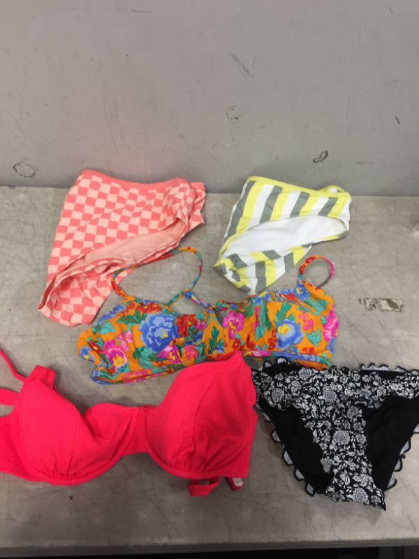 Photo 1 of BAG LOT OF WOMEN'S BIKINIS -BOTTOMS AND TOPS - DIFFERENT STYLES AND SIZES ---SOLD AS IS --