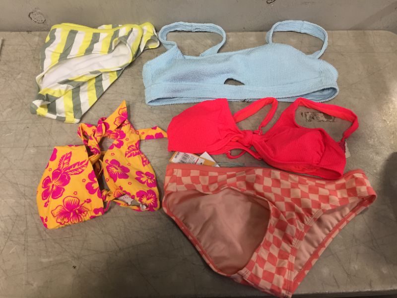 Photo 1 of BAG LOT OF WOMEN'S BIKINIS -BOTTOMS AND TOPS - DIFFERENT STYLES AND SIZES ---SOLD AS IS --