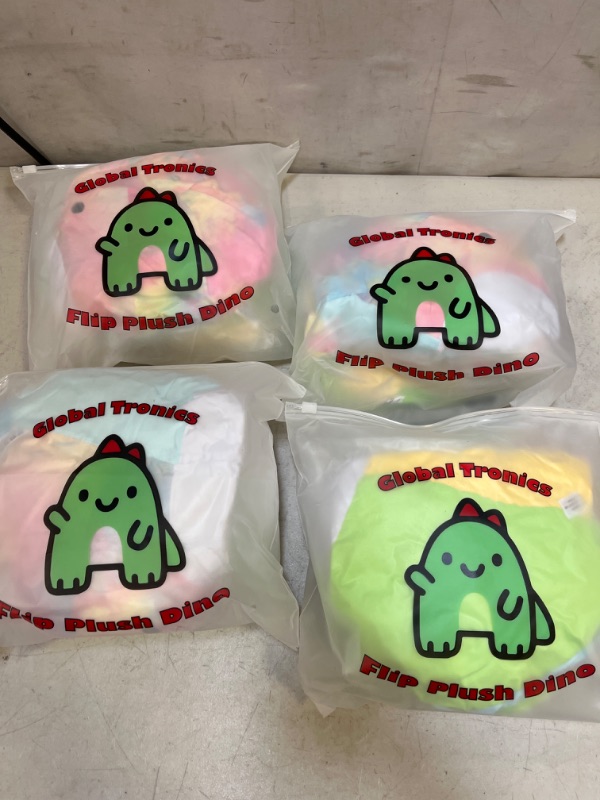 Photo 1 of BABY PLUSH MINI DINO 4 PACK