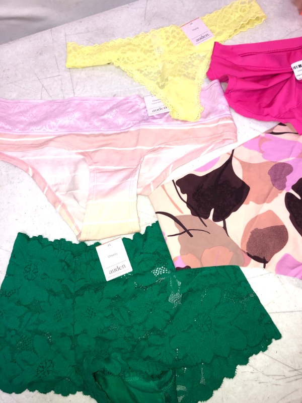 Photo 1 of BIG LOT OF WOMENS UNDERWEAR MAJORITY ARE SIZE SMALL AND XS , 1 PAIR IS MEDIUM , 14 PCS