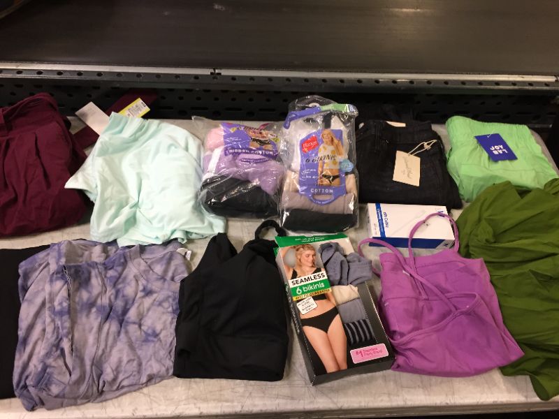 Photo 1 of BAG LOT OF WOMEN CLOTHES DIFFERENT STYLES AND SIZES --SOLD AS IS ---