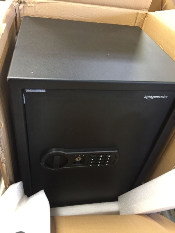 Photo 2 of Amazon Basics Steel Home Security Safe with Programmable Keypad - Secure Documents
NOT SURE IF THERES A KEY PASSCORD UNKNOWN 