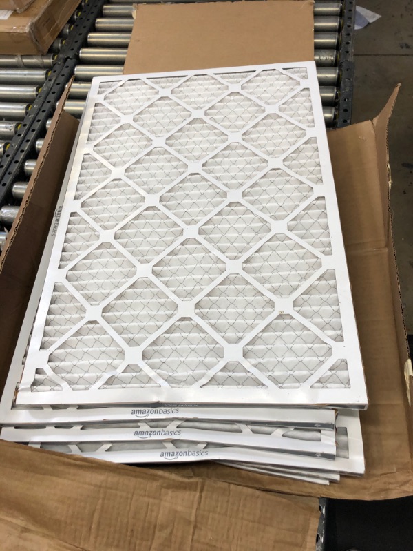 Photo 1 of Amazon Basics Merv 11 AC Furnace Air Filter, 20'' x 30'' x 1'', 6-Pack ------- SLIGHTLY BENT ON ONE SIDE