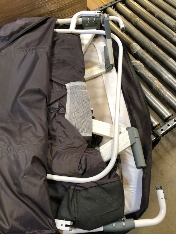 Photo 1 of Evolur Stellar Bassinet and Bedside Sleeper, Easy to Fold and Carry, Lightweight and Portable Baby Bassinet, Height Adjustable, Mattress Pad Included, Beige
