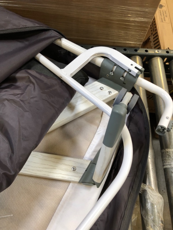 Photo 1 of Evolur Stellar Bassinet and Bedside Sleeper, Easy to Fold and Carry, Lightweight and Portable Baby Bassinet, Height Adjustable, Mattress Pad Included, Beige
