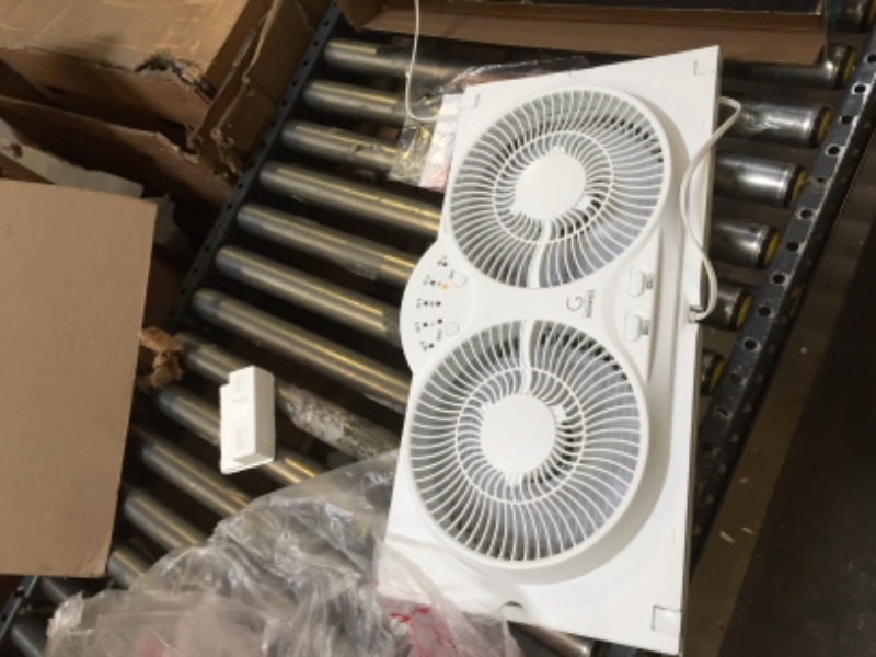 Photo 2 of Genesis Twin Fan High Velocity Reversible AirFlow Fan, LED Indicator Lights Adjustable Thermostat & Max Cool Technology, ETL Certified, White (A1WINDOWFAN)
