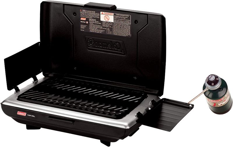 Photo 1 of Coleman Camp Propane Grill , Black, 21" x 12.5" x 5.6"
(DOES NOT INCLUDE PROPANE TANK)
