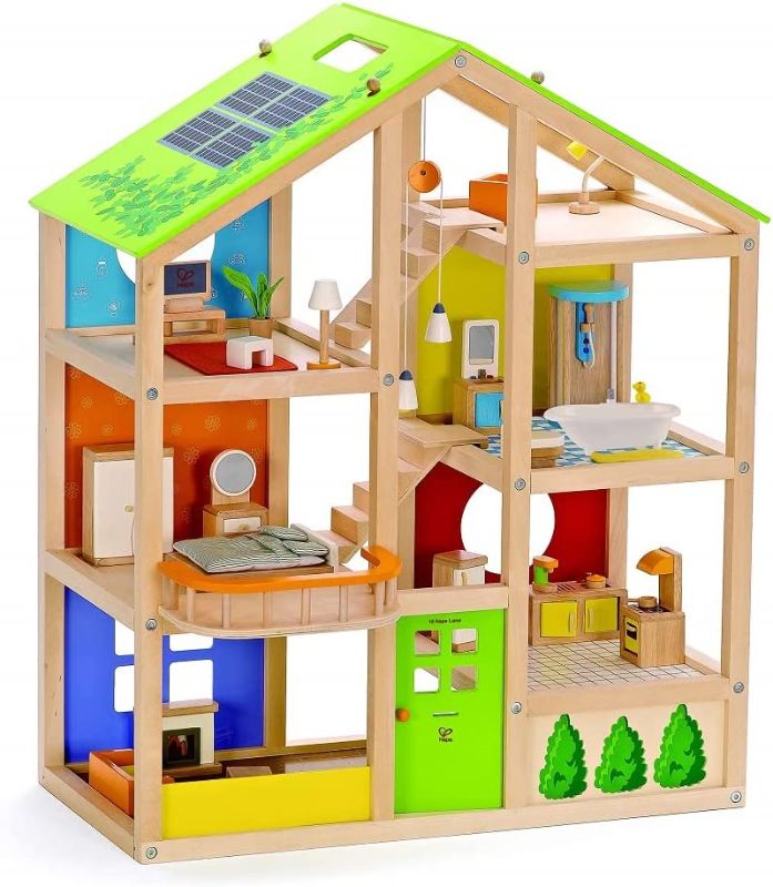Photo 1 of All Seasons Kids Wooden Dollhouse by Hape | Award Winning 3 Story Dolls House Toy with Furniture, Accessories, Movable Stairs and Reversible Season Theme L: 23.6, W: 11.8, H: 28.9 inch
