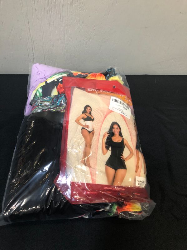Photo 1 of LOT OF CLOTHING 6 ITEMS TOTAL ALL LARGE SIZES AND UP
DRESSES, BATHING SUIT AND SHAPER