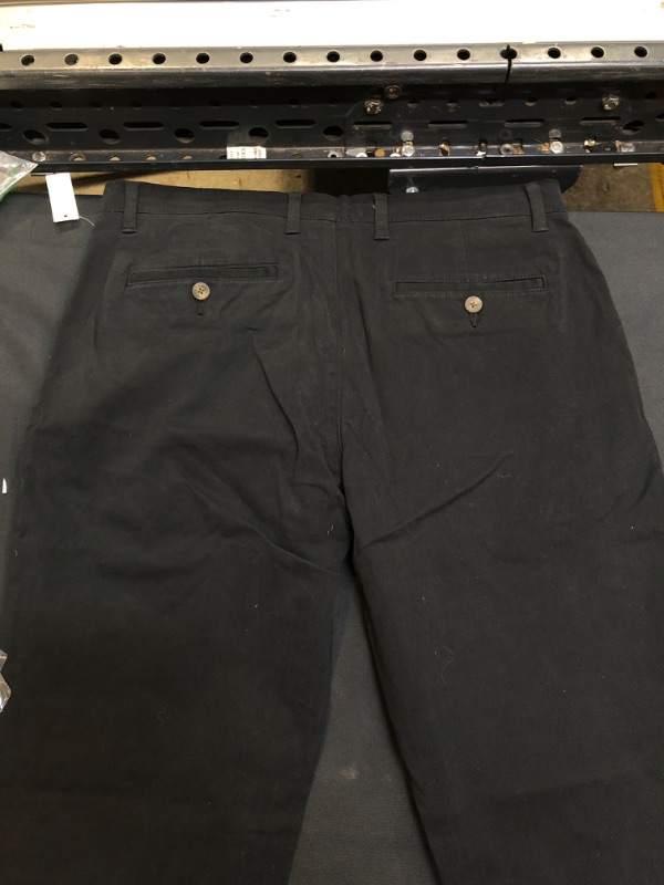 Photo 4 of Amazon Essentials Men's Slim-Fit Casual Stretch Khaki Pant. SIZE 34X31
