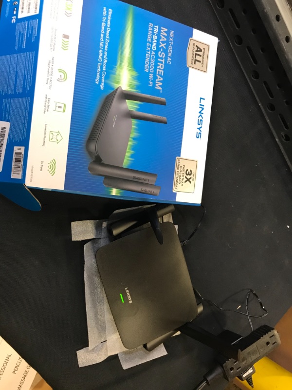 Photo 2 of Linksys RE9000: AC3000 Tri-Band Wi-Fi Extender, Wireless Range Booster for Home, 4 Gigabit Ethernet Ports, Works with Any Wi-Fi Router (Black)

