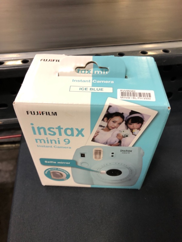 Photo 2 of Fujifilm Instax Mini 9 Instant Camera - Ice Blue, 2.7x4.7x4.6 (Instax Mini 9 - Ice Blue)
open box for pictures 