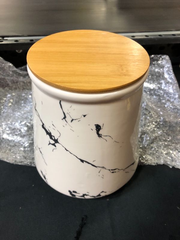 Photo 1 of medium size ceramic canister 