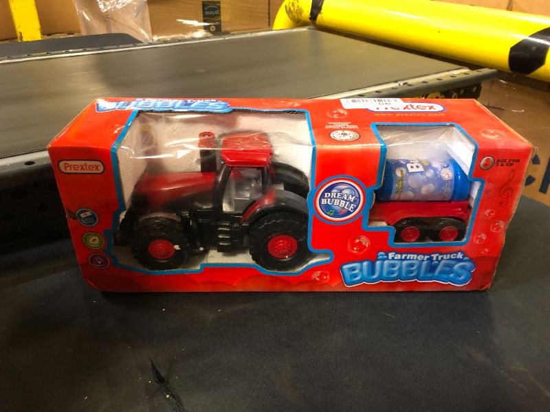 Photo 2 of Bump & Go Bubble Blowing Farm Tractor Truck with Lights, Sounds ,and Action – Bubble Solution Included - Fun Toy and Gift for Kids (Boys & Girls)
