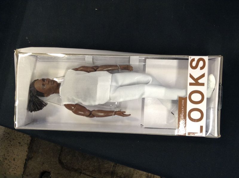 Photo 2 of Barbie Signature Looks Ken Doll (Brunette with Braids & Bun Hairstyle) Fully Posable Fashion Doll Wearing White Shirt & Pants, Gift for Collectors