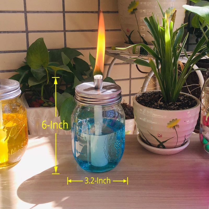 Photo 2 of Aobik Multicolored Glass Outdoor Tabletop Torch Set, Fiberglass Wicks,Stainless Steel Lid with Fire Cover Caps,6-inch High,Blue,Green,Yellow & Rose,Set of 4 (4 Colors Jars Included)