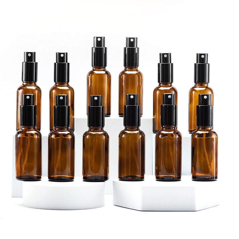 Photo 1 of Yizhao 1oz Amber Glass Spray Bottle for Essential Oil, Empty Small Spray Bottle with Fine Mist,Refillable for Travel,Cleaning, Cologne,Perfume,Plant,Hair,Aromatherapy,Makeup,Chemical–12 Pcs