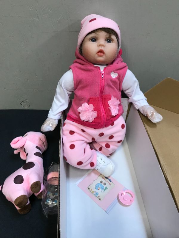 Photo 1 of CHAREX Reborn Baby Dolls - 22 inches Realistic Newborn Soft Vinyl Baby Dolls Toy for Kids Age 3+
