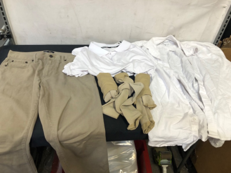 Photo 1 of BAG LOT OF MENS ITEM--- BUTTON UP SHIRT SIZE L, WHITE COLLOR SHIRT SIZE L, GAP JEANS SIZE 30 X30, AND 3 PAIR OF TAN SOCKS 
---JEANS HAVE A SMALL BLUE STAIN--- ----SOLD AS IS ----------