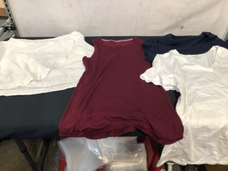 Photo 1 of BAG LOT OF WOMENS CLOTHING WINE RED TANK SIZE M, TWO V-NECK T-SHIRTS NAVY AND WHITE SIZE XL, WHITE Tennis Skirt Skirts with Lining Shorts SIZE L  (YELLOW STAIN BOTTON OF SKIRT) --- SOLD AS IS ----