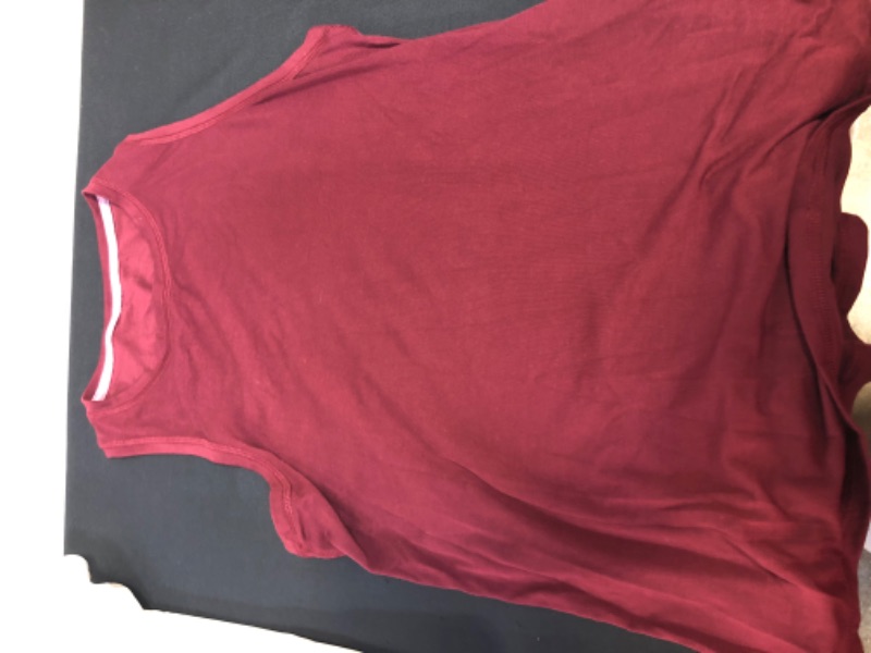 Photo 2 of BAG LOT OF WOMENS CLOTHING WINE RED TANK SIZE M, TWO V-NECK T-SHIRTS NAVY AND WHITE SIZE XL, WHITE Tennis Skirt Skirts with Lining Shorts SIZE L  (YELLOW STAIN BOTTON OF SKIRT) --- SOLD AS IS ----