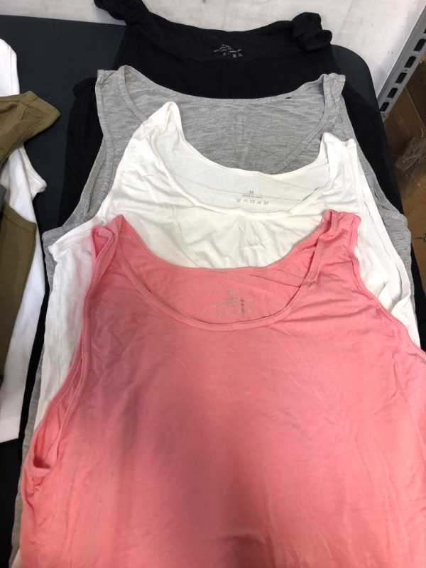 Photo 4 of BAG OF WOMENS CLOTHING ITEMS- PINK SHIRT SIZE M,  4 PACK OF CROP TOPS SIZE L, 4 PACK OF TANKS SIZE M ---- SOLD AS IS ----  