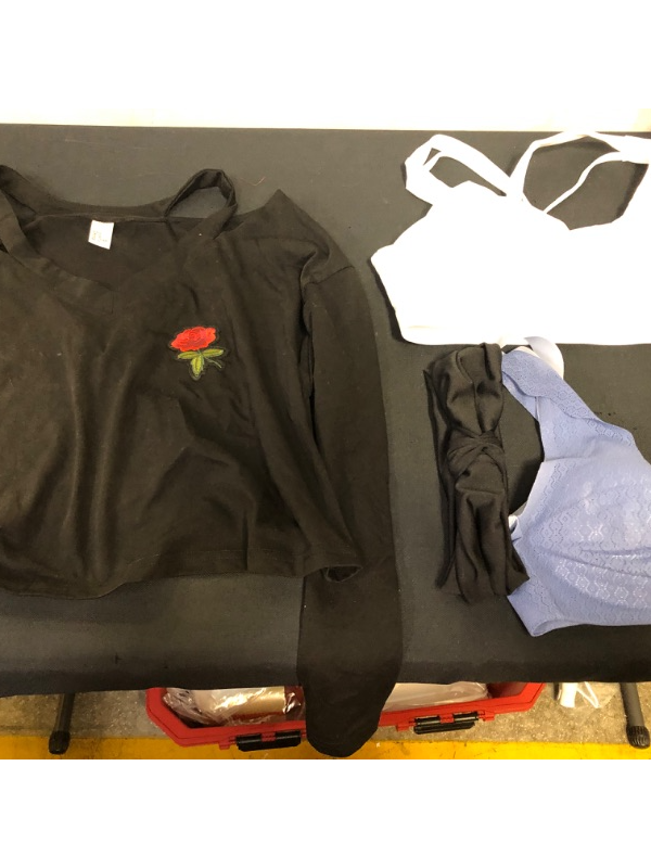 Photo 1 of BAG LOT OF WOMENS CLOTHING- BLACK CROP WITH ROSE SIZE M ( WHITE STAIN), WHITE SPORTS BRA SIZE L (BLUE STAIN IN THE CENTER), BLUE HANES BRA SIZE M (YELLOW STAIN INSIDE BRA), BLACK HEAD BAND ---- SOLD AS IS ----