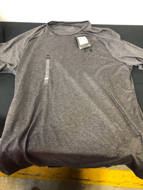 Photo 3 of BAG OF MENS SHIRTS- RUSSELL ATHLETIC TANK SIZE L, UNDER ARMOUR SHIRT GREY SIZE M, BLACK BUTTON UP SIZE XL --- SOLD AS IS ---