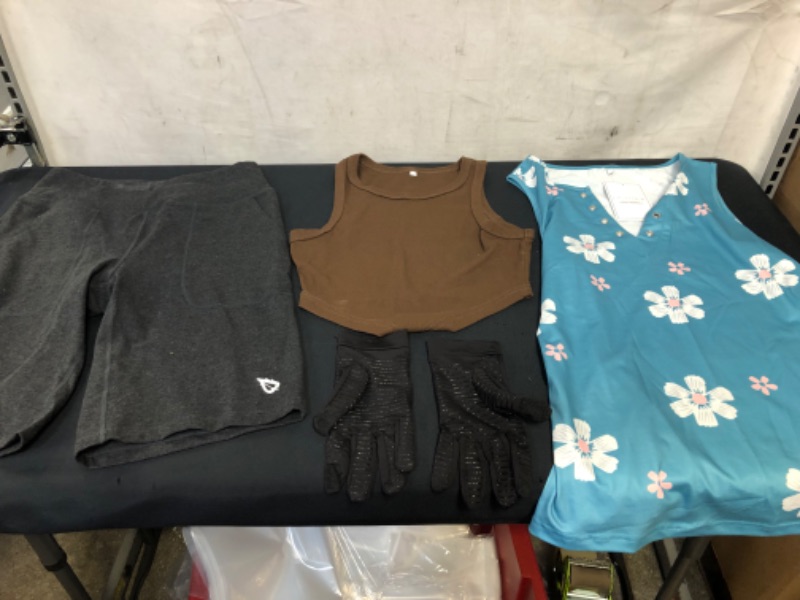 Photo 1 of BAG LOT OF WOMEN ITEMS- CAPRI GRAY SHORTS SIZE S (WHITE STAIN ON BAND), BROWN CROP TOP SIZE XS (SMALL WHITE STAIN), 
BLUE BLOUSE SIZE S, BLACK GLOVES. --- SOLD AS IS ---