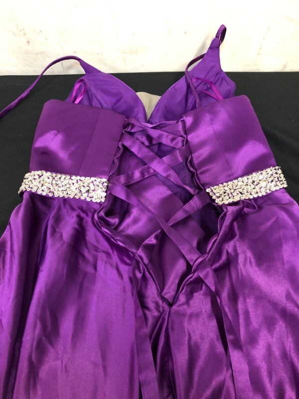 Photo 4 of DRESS PURPLE WITH RHINESTONE DRESS PROM, OR BRIDESMAID SIZE M/L
 ---LEFT STRAP IS RIPPED--- --- BOTTOM OF DRESS HAS DIRT ---