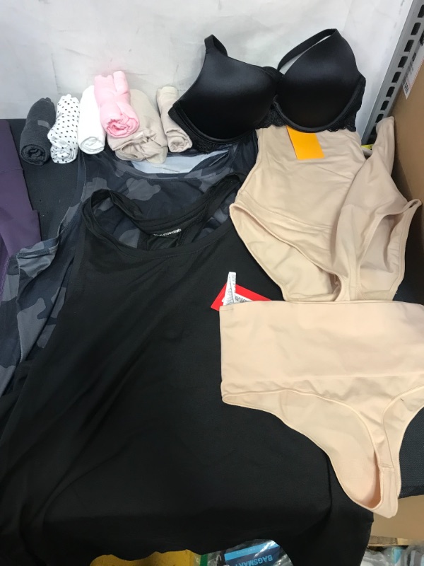 Photo 2 of BAG LOT OF WOMENS CLOTHING SIZE M SHIRT, LEGGINGS, UNDERWEAR  (BLACK LONG SLEEVE HAS WHITE STAINS) --- SOLD AS IS ----