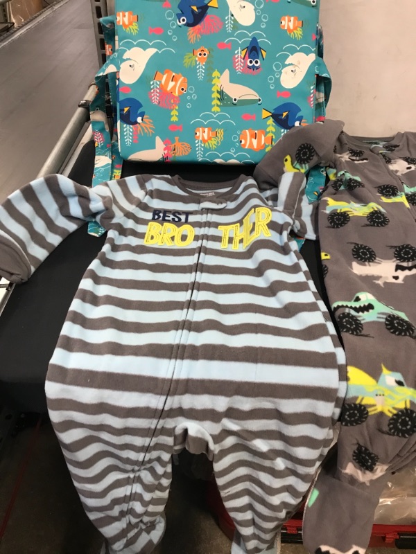 Photo 1 of BAG LOT OF KIDS ITEMS- 3 PIECE ONESIES SIZE 3T, TODDLER BOOSTER SEAT DINING (HAS STAINS), TWO ELECTRIC SOFT FISH 
--- SOLD AS IS ----