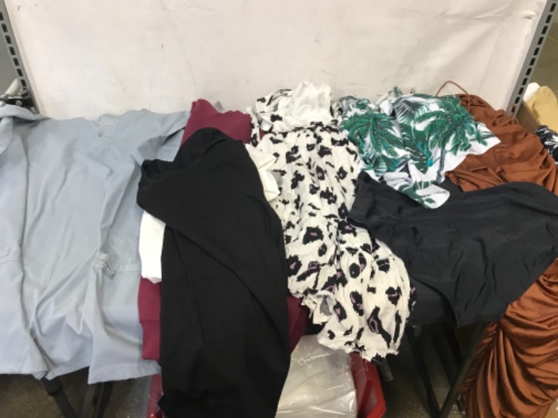 Photo 1 of BAG LOT OF WOMENS CLOTHING- TANKS, SHIRTS, DRESSES, SWIMWEAR ALL SIZE L --- SOLD AS IS ---