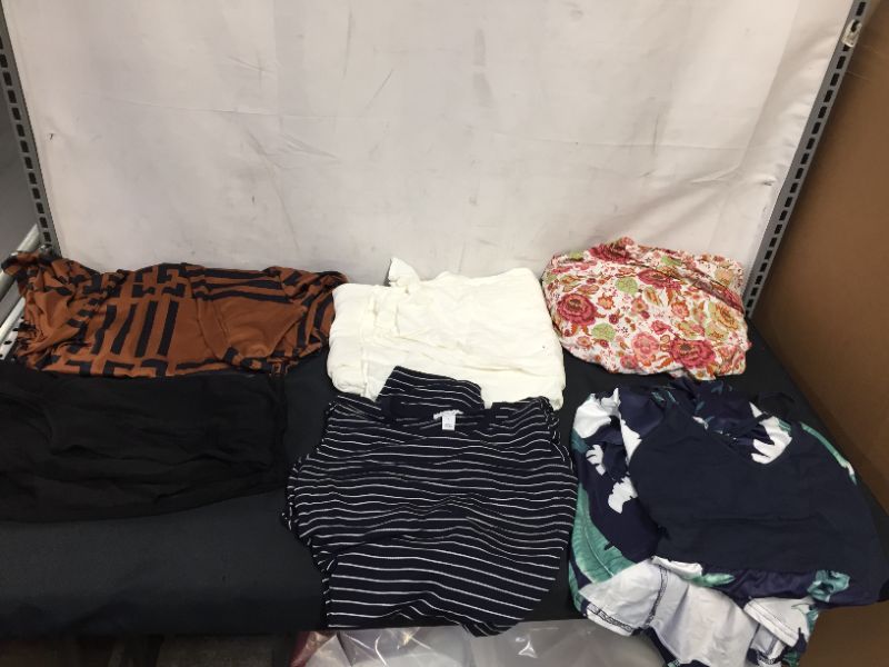 Photo 1 of Bag lot of Multi Clothes for Women Sizes Vary - SOLD AS IS - 
